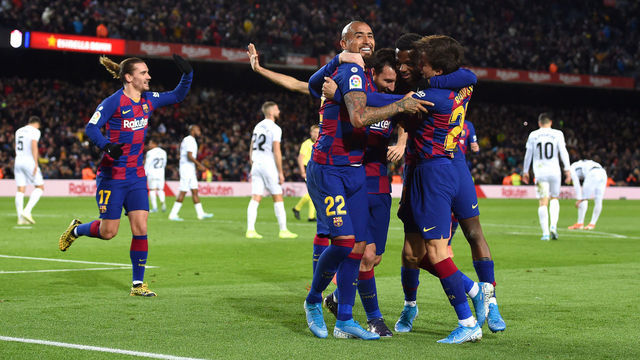 BARCELONA, SPAIN - JANUARY 19: Lionel Messi of FC Barcelona celebrates with his team mates after scoring his team's first goal during the La Liga match between FC Barcelona and Granada CF at Camp Nou on January 19, 2020 in Barcelona, Spain.