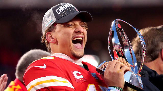 KANSAS CITY, MISSOURI - JANUARY 19: Patrick Mahomes #15 of the Kansas City Chiefs holds up the Lamar Hunt trophy after defeating the Tennessee Titans in the AFC Championship Game at Arrowhead Stadium on January 19, 2020 in Kansas City, Missouri. The Chiefs defeated the Titans 35-24.