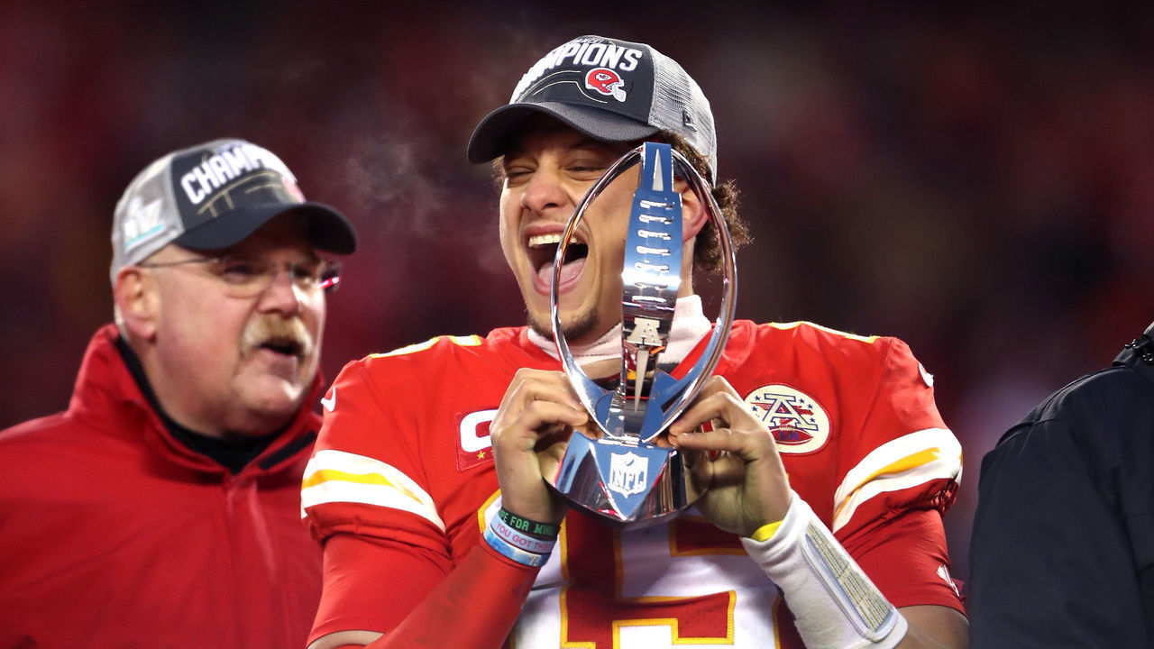 KANSAS CITY, MISSOURI - JANUARY 19: Patrick Mahomes #15 of the Kansas City Chiefs holds up the Lamar Hunt trophy after defeating the Tennessee Titans in the AFC Championship Game at Arrowhead Stadium on January 19, 2020 in Kansas City, Missouri. The Chiefs defeated the Titans 35-24.