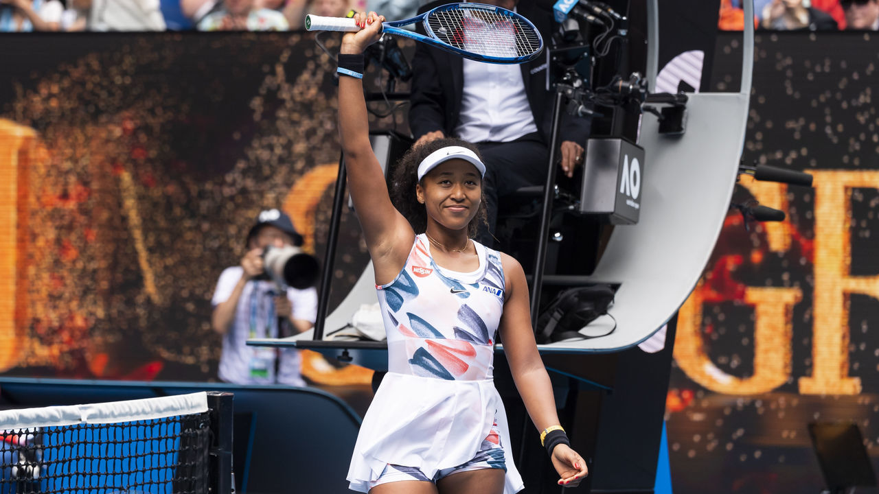 MELBOURNE, AUSTRALIA - JANUARY 20: Naomi Osaka of Japan celebrates winning her first round match against Marie Bouzkova of the Czech Republic on day one of the 2020 Australian Open at Melbourne Park on January 20, 2020 in Melbourne, Australia.