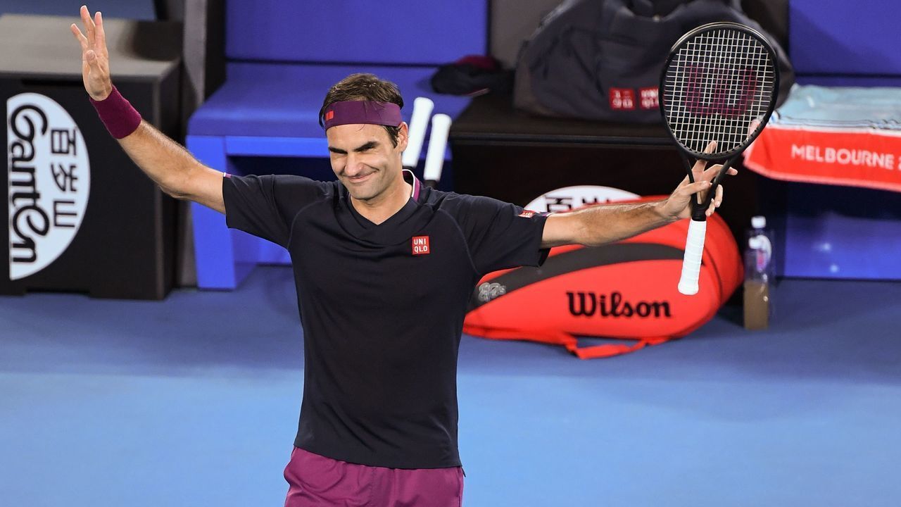 Switzerland's Roger Federer celebrates after victory against Steve Johnson of the US during their men's singles match on day one of the Australian Open tennis tournament in Melbourne on January 20, 2020.