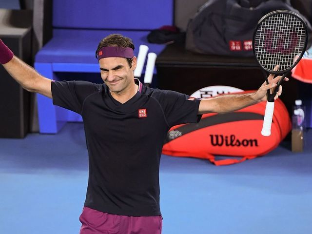 Switzerland's Roger Federer celebrates after victory against Steve Johnson of the US during their men's singles match on day one of the Australian Open tennis tournament in Melbourne on January 20, 2020.