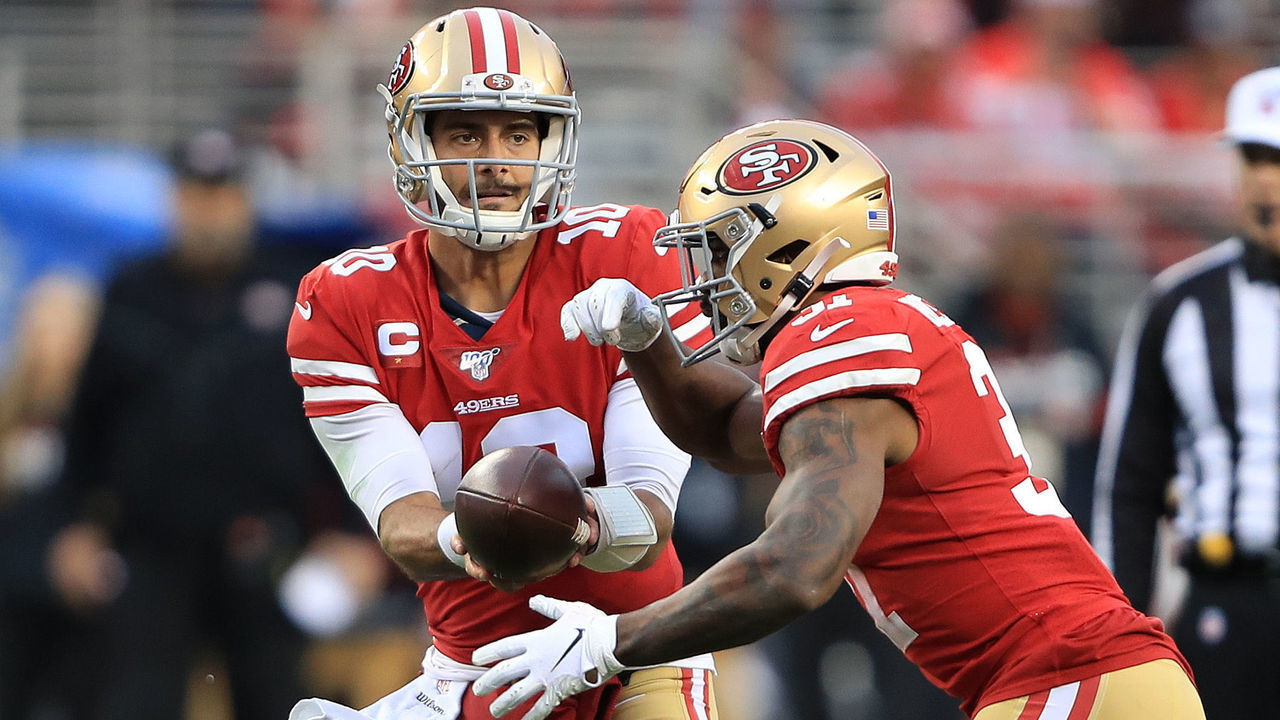 SANTA CLARA, CALIFORNIA - JANUARY 19: Jimmy Garoppolo #10 of the San Francisco 49ers looks to hand the ball off against the Green Bay Packers during the NFC Championship game at Levi's Stadium on January 19, 2020 in Santa Clara, California.