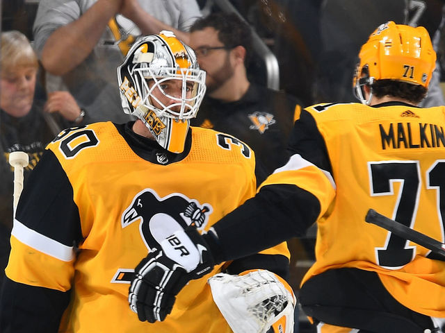 PITTSBURGH, PA - MARCH 07: Matt Murray #30 of the Pittsburgh Penguins celebrates with Evgeni Malkin #71 after a 3-0 win over the Columbus Blue Jackets at PPG Paints Arena on March 7, 2019 in Pittsburgh, Pennsylvania.