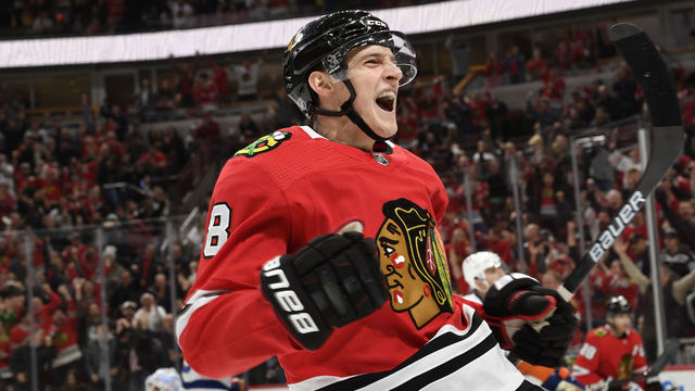 CHICAGO, IL - DECEMBER 27: Dominik Kubalik #8 of the Chicago Blackhawks reacts after scoring against the New York Islanders in the first period at the United Center on December 27, 2019 in Chicago, Illinois.