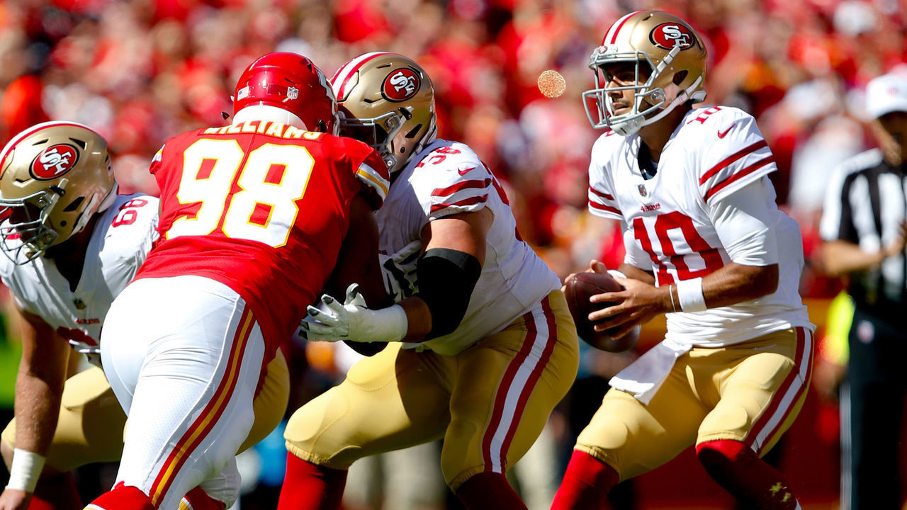 KANSAS CITY, MO - SEPTEMBER 23: Weston Richburg #58 of the San Francisco 49ers blocks for Jimmy Garoppolo #10 during the game against the Kansas City Chiefs at Arrowhead Stadium on September 23, 2018 in Kansas City, Missouri. The Chiefs defeated the 49ers 38-27.