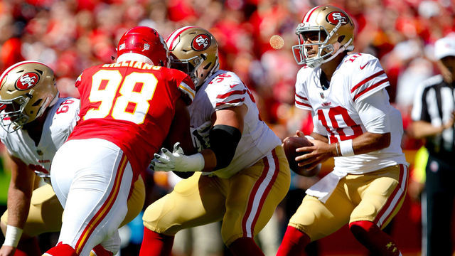 KANSAS CITY, MO - SEPTEMBER 23: Weston Richburg #58 of the San Francisco 49ers blocks for Jimmy Garoppolo #10 during the game against the Kansas City Chiefs at Arrowhead Stadium on September 23, 2018 in Kansas City, Missouri. The Chiefs defeated the 49ers 38-27.