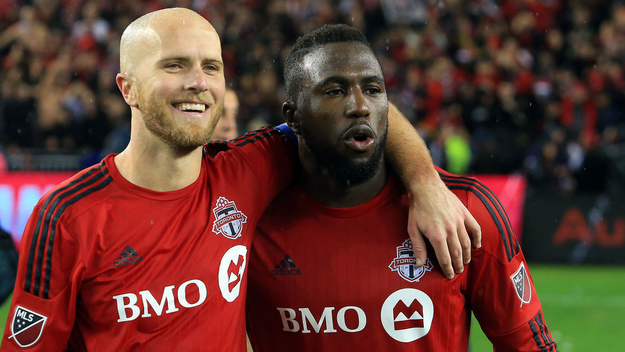 TORONTO, ON - NOVEMBER 30: Michael Bradley #4 of Toronto FC celebrates with Jozy Altidore #17 at the final whistle following the MLS Eastern Conference Final, Leg 2 game against Montreal Impact at BMO Field on November 30, 2016 in Toronto, Ontario, Canada.