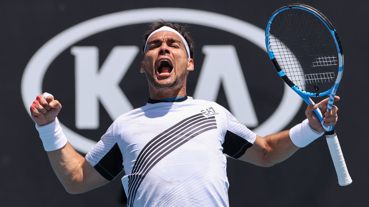 Italy's Fabio Fognini celebrates after victory against Reilly Opelka of the US during their men's singles match on day two of the Australian Open tennis tournament in Melbourne on January 21, 2020.