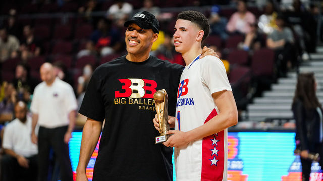 LAS VEGAS, NEVADA - MARCH 31: LaVar Ball presents an award to son LaMelo Ball after the Big Baller Brand All American Game at the Orleans Arena on March 31, 2019 in Las Vegas, Nevada.