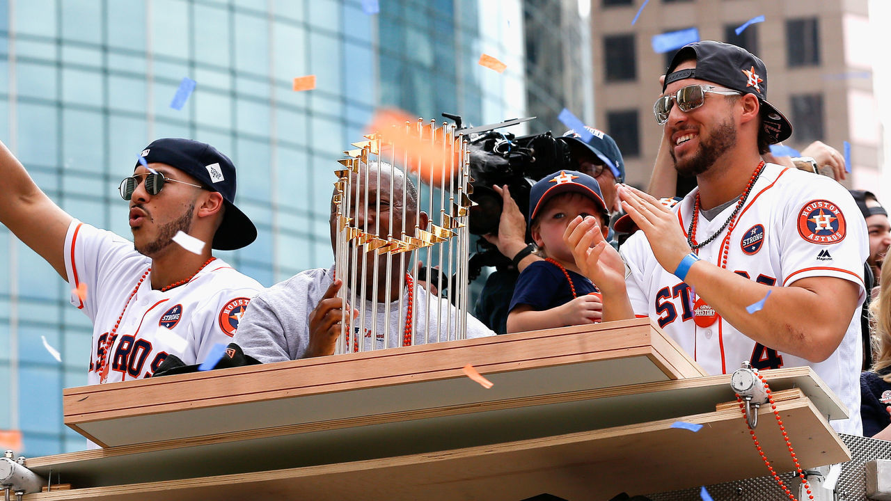 HOUSTON, TX - NOVEMBER 03: Carlos Correa, left, and George Springer of the Houston Astros during the Houston Astros Victory Parade on November 3, 2017 in Houston, Texas. The Astros defeated the Los Angeles Dodgers 5-1 in Game 7 to win the 2017 World Series.