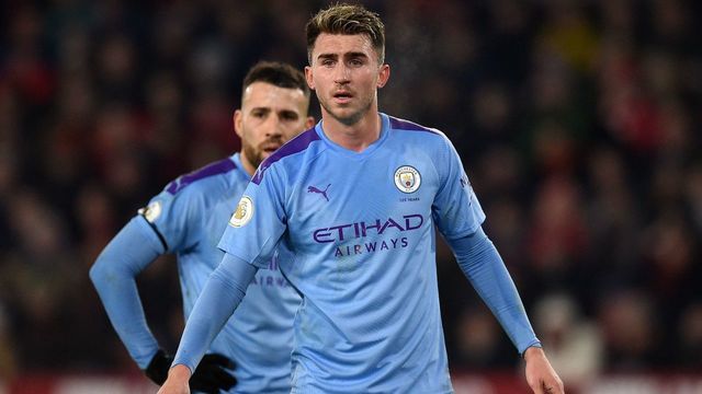 Manchester City's French defender Aymeric Laporte (R) reacts during the English Premier League football match between Sheffield United and Manchester City at Bramall Lane in Sheffield, northern England on January 21, 2020.