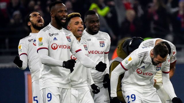 Lyon's players celebrate after winning the French League Cup semifinal football match between Olympique Lyonnais and Lille LOSC at the Groupama stadium in Decines-Charpieu near Lyon, central eastern France on January 21, 2020.