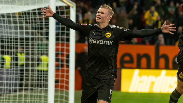AUGSBURG, GERMANY - JANUARY 18: (BILD ZEITUNG OUT) Erling Haaland of Borussia Dortmund celebrates after scoring his team's fifth goal during the Bundesliga match between FC Augsburg and Borussia Dortmund at WWK-Arena on January 18, 2020 in Augsburg, Germany.