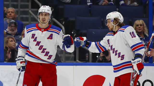 TAMPA, FL - NOVEMBER 14: New York Rangers center Chris Kreider (20) celebrates with New York Rangers center Artemi Panarin (10) after scoring a goal in the 1st period of the NHL game between the New York Rangers and Tampa Bay Lightning on November 14, 2019 at Amalie Arena in Tampa, FL.