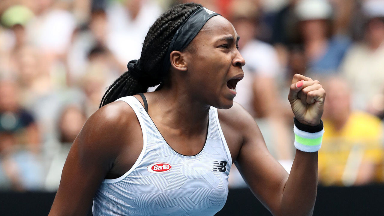 MELBOURNE, AUSTRALIA - JANUARY 22: Coco Gauff of the United States celebrates after winning match point during her Women's Singles second round match against Sorana Cirstea of Romania on day three of the 2020 Australian Open at Melbourne Park on January 22, 2020 in Melbourne, Australia.