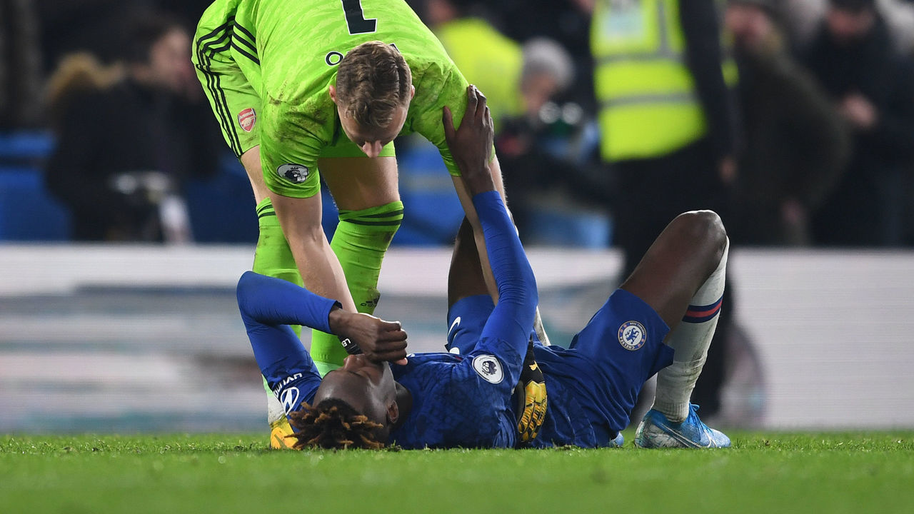 LONDON, ENGLAND - JANUARY 21: Bernd Leno of Arsenal checks on Tammy Abraham of Chelsea after the Premier League match between Chelsea FC and Arsenal FC at Stamford Bridge on January 21, 2020 in London, United Kingdom.