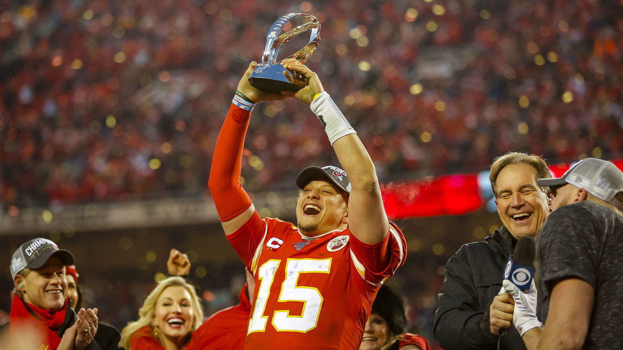 KANSAS CITY, MO - JANUARY 19: Patrick Mahomes #15 of the Kansas City Chiefs holds up the Lamar Hunt trophy after defeating the Tennessee Titans in the AFC Championship Game at Arrowhead Stadium on January 19, 2020 in Kansas City, Missouri. The Chiefs defeated the Titans 35-24.