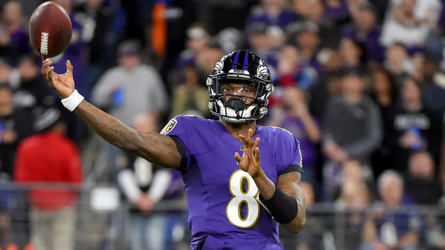 BALTIMORE, MARYLAND - JANUARY 11: Lamar Jackson #8 of the Baltimore Ravens throws against the Tennessee Titans during the AFC Divisional Playoff game at M&T Bank Stadium on January 11, 2020 in Baltimore, Maryland.