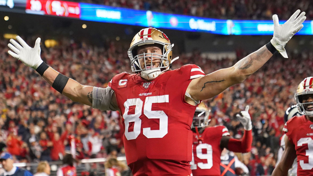 SANTA CLARA, CALIFORNIA - DECEMBER 21: George Kittle #85 of the San Francisco 49ers celebrates after catching a touchdown pass against the Los Angeles Rams during the second half of an NFL football game at Levi's Stadium on December 21, 2019 in Santa Clara, California.