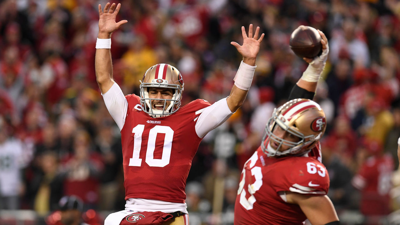 SANTA CLARA, CA - JANUARY 19: San Francisco 49ers' quarterback Jimmy Garoppolo (10) celebrates a touchdown by teammate Raheem Mostert (31) in the second quarter of their NFC Championship game at Levi's Stadium in Santa Clara, Calif., on Sunday, Jan. 19, 2020 (Jose Carlos Fajardo/MediaNews Group/The Mercury News via Getty Images)