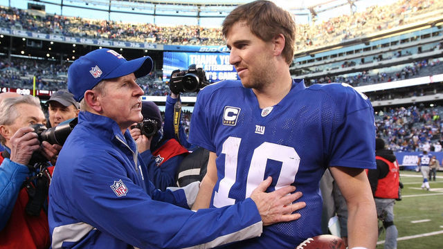 EAST RUTHERFORD, NJ - NOVEMBER 28: Eli Manning #10 of the New York Giants is met by Giants Head Coach Tom Coughlin after their 24-20 win against the Jacksonville Jaguars on November 28, 2010 at The New Meadowlands Stadium in East Rutherford, New Jersey.
