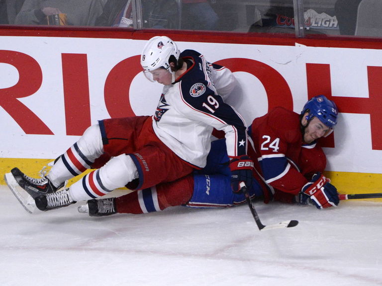 VIDEO Glassbanging Canadiens fan gets knocked down by hit