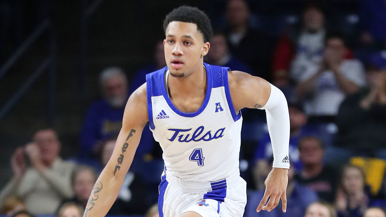 TULSA, OK - JANUARY 22: Tulsa Golden Hurricane Guard Isaiah Hill (4) dribbles during a college basketball game between the Tulsa Golden Hurricane and the Memphis Tigers on January 22, 2020, at the Donald W. Reynolds Center in Tulsa, OK.
