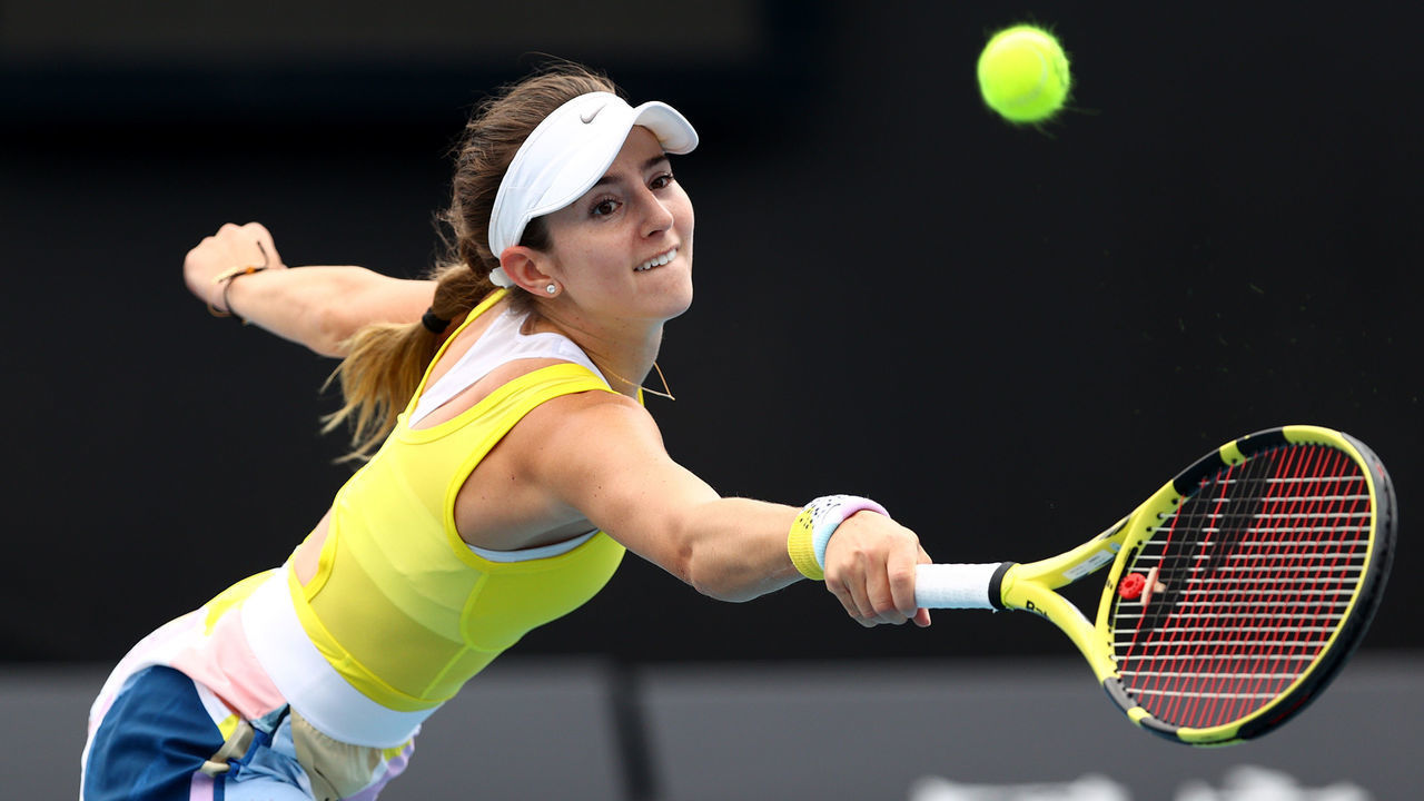 MELBOURNE, AUSTRALIA - JANUARY 23: Catherine Bellis of the United States plays a backhand during her Women's Singles second round match against Karolina Muchova of Czech Republic on day four of the 2020 Australian Open at Melbourne Park on January 23, 2020 in Melbourne, Australia.