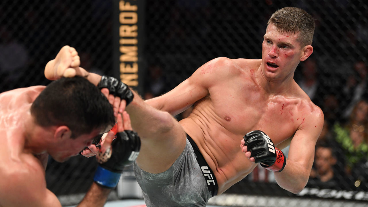 NEW YORK, NEW YORK - NOVEMBER 02: (R-L) Stephen Thompson kicks Vicente Luque of Brazil in their welterweight bout during the UFC 244 event at Madison Square Garden on November 02, 2019 in New York City.