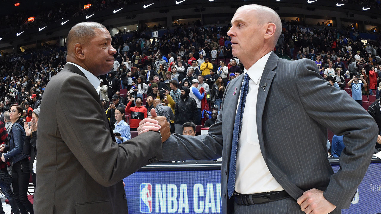 LOS ANGELES, CA - OCTOBER 17: Doc Rivers of the LA Clippers and Rick Carlisle of the Dallas Mavericks shake hands after the game on October 17, 2019 at Rogers Arena in Vancouver, Canada. NOTE TO USER: User expressly acknowledges and agrees that, by downloading and/or using this Photograph, user is consenting to the terms and conditions of the Getty Images License Agreement. Mandatory Copyright Notice: Copyright 2019 NBAE