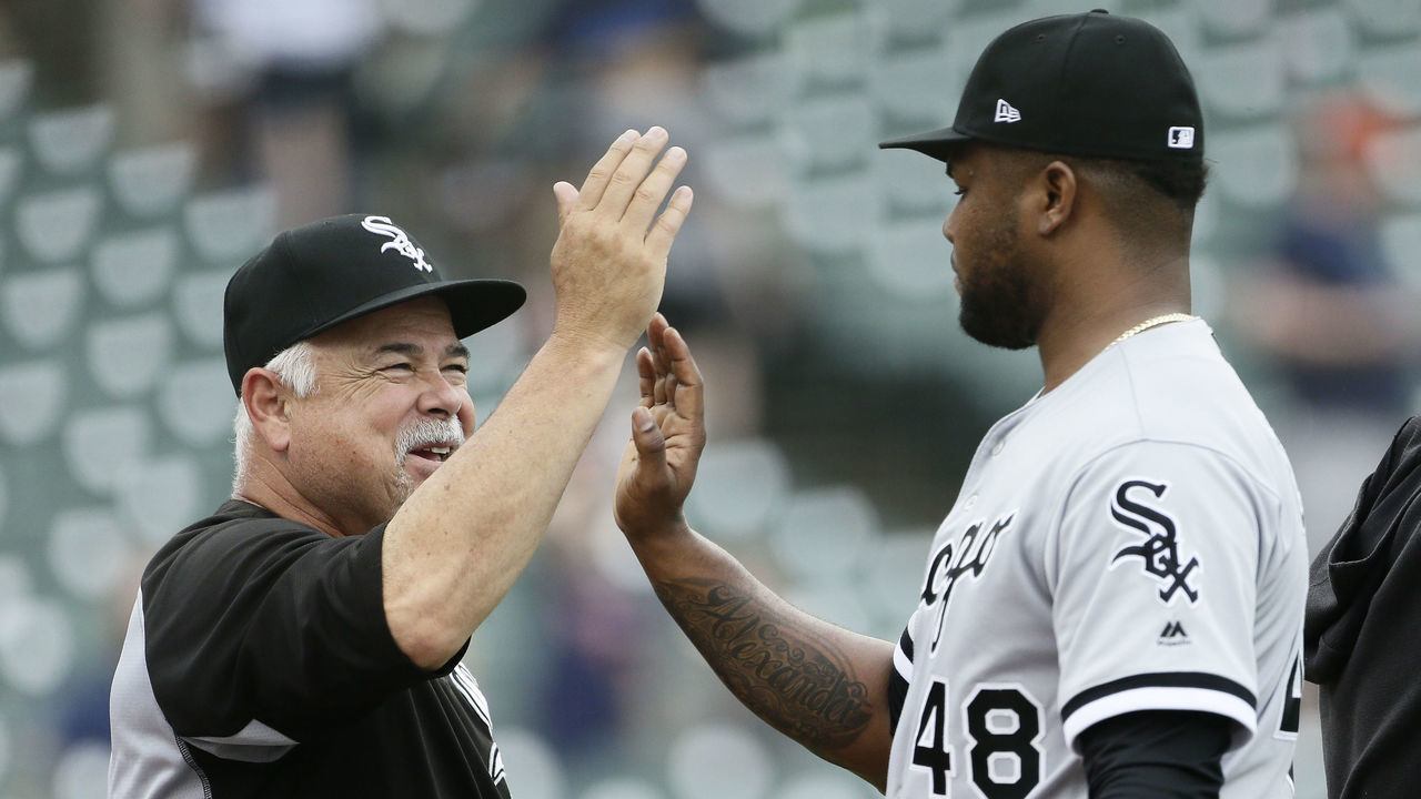 DETROIT, MI - AUGUST 6: Manager Rick Renteria #36 of the Chicago White Sox celebrates with closer Alex Colome #48 of the Chicago White Sox after recording his 22nd save in a 5-3 win over the Detroit Tigers in game one of a doubleheader at Comerica Park on August 6, 2019 in Detroit, Michigan.
