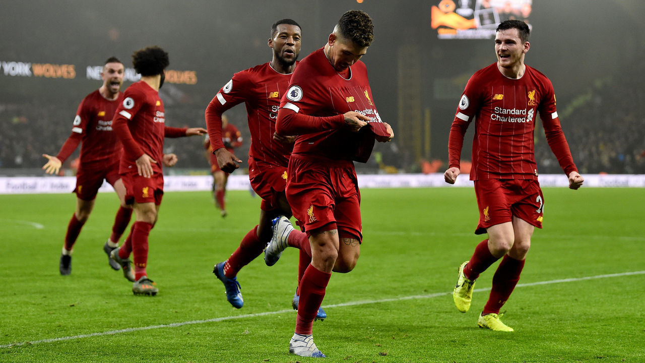 WOLVERHAMPTON, ENGLAND - JANUARY 23: (THE SUN OUT, THE SUN ON SUNDAY OUT) Roberto Firmino of Liverpool celebrates after scoring the second goal making the score 1-2 during the Premier League match between Wolverhampton Wanderers and Liverpool FC at Molineux on January 23, 2020 in Wolverhampton, United Kingdom.
