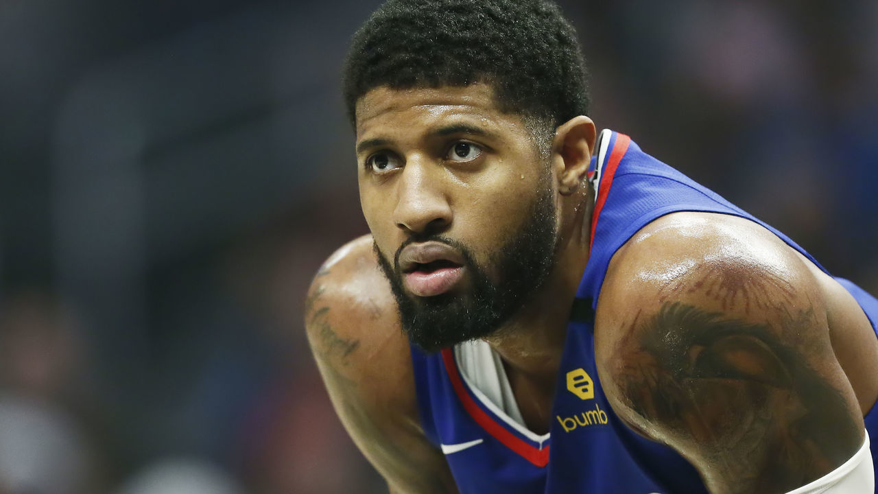 LOS ANGELES, CA - JANUARY 5: Paul George #13 of the LA Clippers looks on against the New York Knicks on January 5, 2020 at STAPLES Center in Los Angeles, California. NOTE TO USER: User expressly acknowledges and agrees that, by downloading and/or using this Photograph, user is consenting to the terms and conditions of the Getty Images License Agreement. Mandatory Copyright Notice: Copyright 2020 NBAE