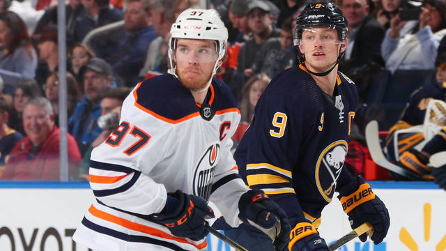 BUFFALO, NY - JANUARY 2: Connor McDavid #97 of the Edmonton Oilers skates against Jack Eichel #9 of the Buffalo Sabres during an NHL game on January 2, 2020 at KeyBank Center in Buffalo, New York.