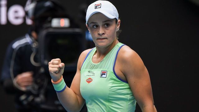 Australia's Ashleigh Barty celebrates after victory against Kazakhstan's Elena Rybakina during their women's singles match on day five of the Australian Open tennis tournament in Melbourne on January 24, 2020.