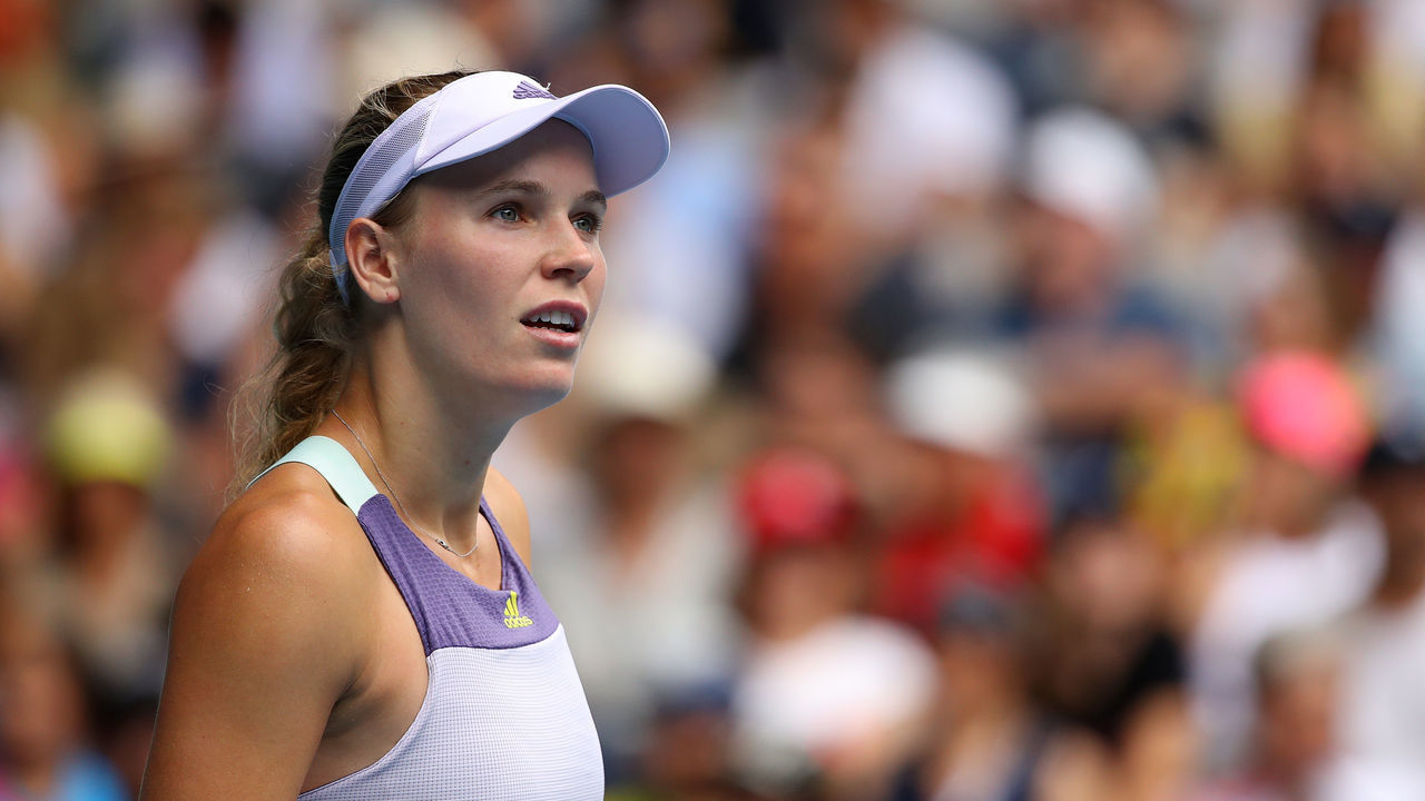 MELBOURNE, AUSTRALIA - JANUARY 24: Caroline Wozniacki of Denmark looks on during her Women's Singles third round match against Ons Jabeur of Tunisia on day five of the 2020 Australian Open at Melbourne Park on January 24, 2020 in Melbourne, Australia.