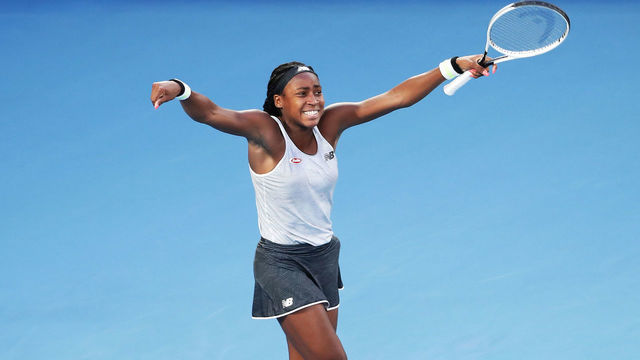 MELBOURNE, AUSTRALIA - JANUARY 24: Coco Gauff of the United States celebrates after winning match point during her Women's Singles third round match against Naomi Osaka of Japan on day five of the 2020 Australian Open at Melbourne Park on January 24, 2020 in Melbourne, Australia.
