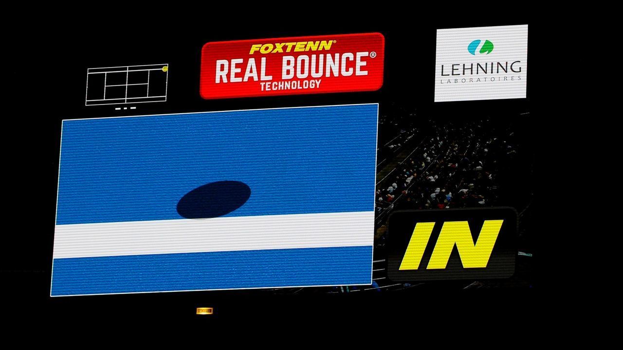 A giant screen displays a build provided by the new line-calling technology system Foxtenn iduring the ATP Moselle Open final tennis on September 24, 2017 in Metz, eastern France. This new system is said to have zero systemic error, whereas the current system, Hawk Eye, currently has a 1% error rate / AFP PHOTO / JEAN-CHRISTOPHE VERHAEGEN