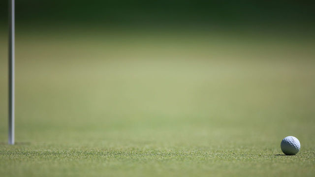 CROMWELL, CONNECTICUT- June 24: A generic image of a golf ball near the pin during the Travelers Championship Tournament at the TPC River Highlands Golf Course on June 24th, 2017 in Cromwell, Connecticut.
