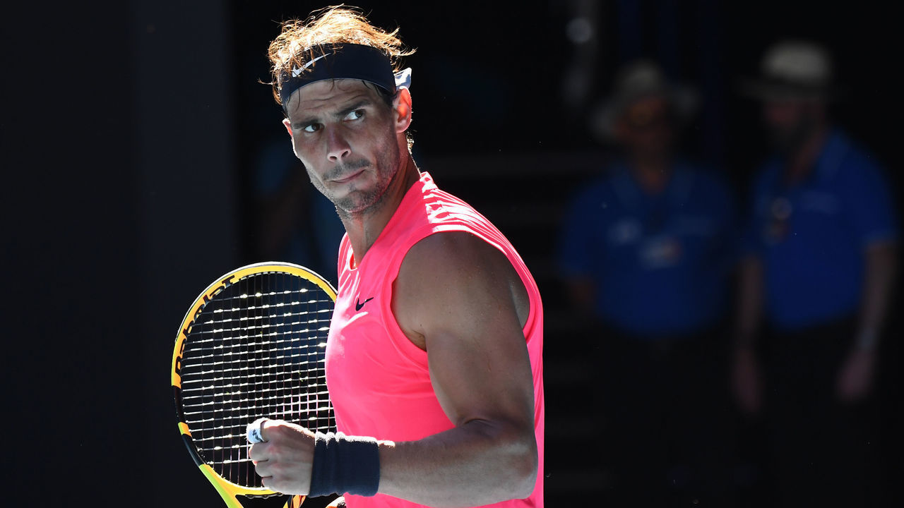 Spain's Rafael Nadal celebrates after beating Spain's Pablo Carreno Busta during their men's singles match on day six of the Australian Open tennis tournament in Melbourne on January 25, 2020.