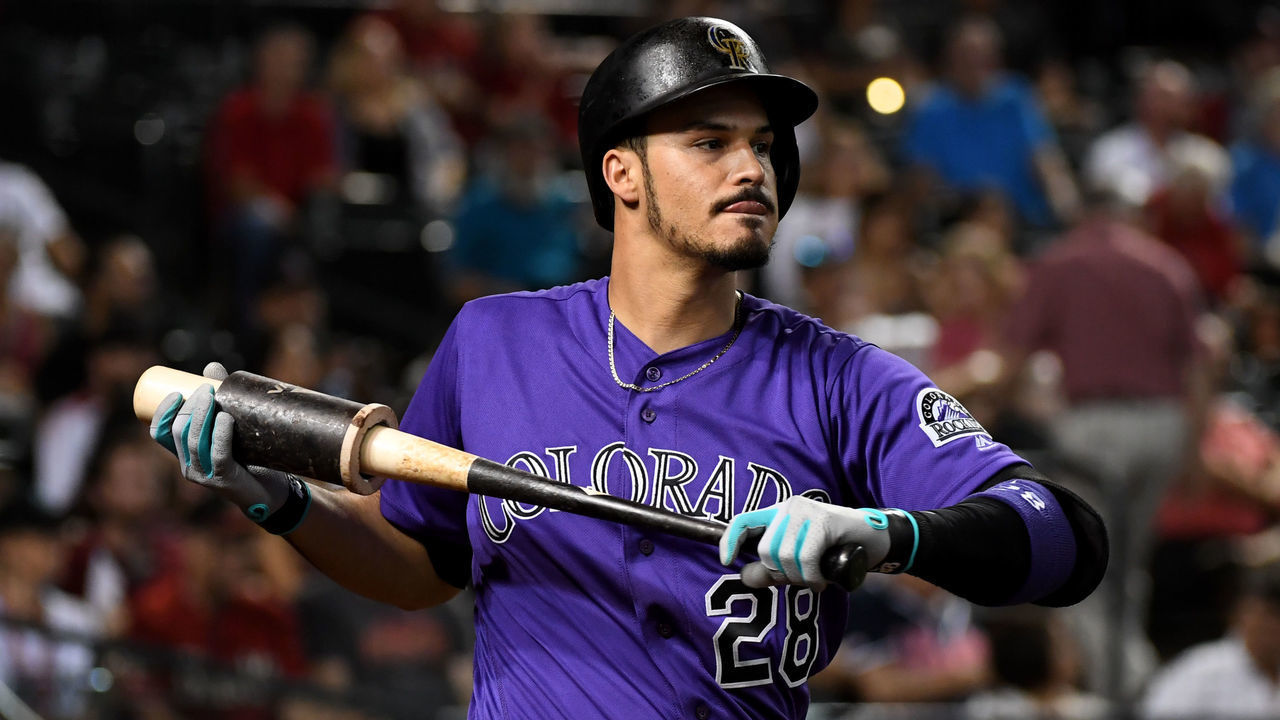 PHOENIX, ARIZONA - AUGUST 20: Nolan Arenado #28 of the Colorado Rockies waits in the on-deck circle against the Arizona Diamondbacks during the first inning at Chase Field on August 20, 2019 in Phoenix, Arizona. Arenado was playing in his 1,000th MLB game.