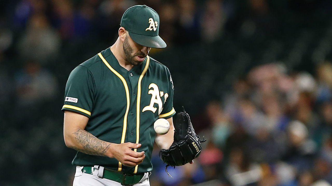 SEATTLE, WA - SEPTEMBER 27: Mike Fiers #50 of the Oakland Athletics tosses the ball after giving up a run in the third inning against the Seattle Mariners at T-Mobile Park on September 27, 2019 in Seattle, Washington.