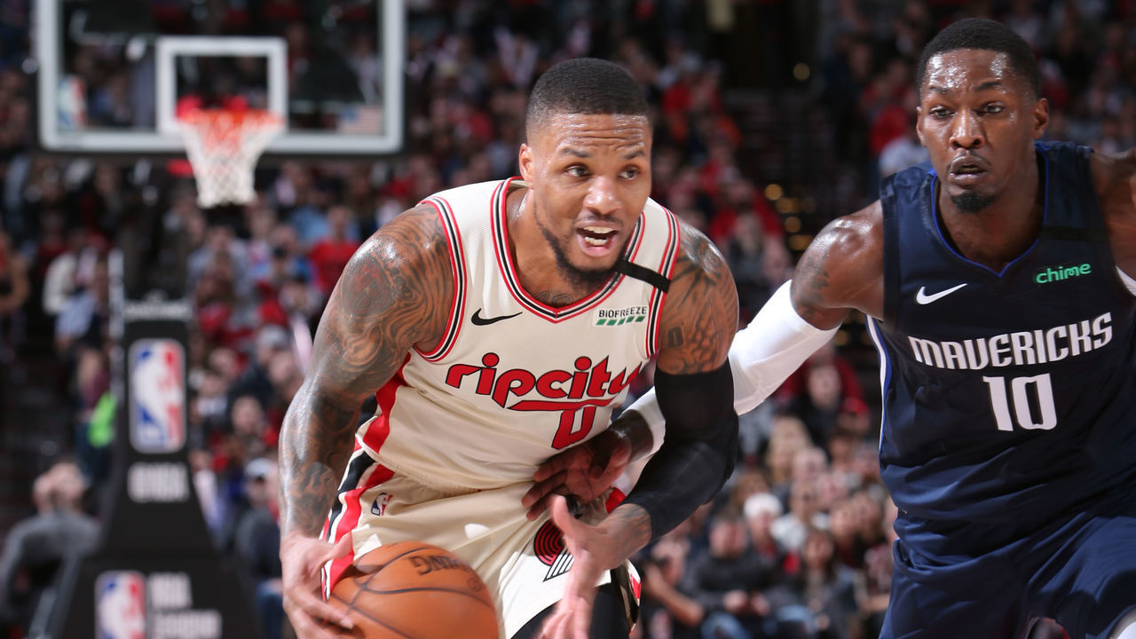 PORTLAND, OR - JANUARY 23: Damian Lillard #0 of the Portland Trail Blazers drives to the basket against the Dallas Mavericks on January 23, 2020 at the Moda Center Arena in Portland, Oregon. Mandatory Copyright Notice: Copyright 2020 NBAE