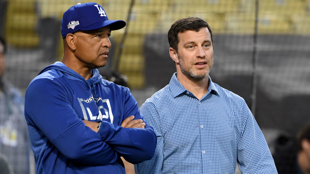 LOS ANGELES, CA - OCTOBER 1: Dave Roberts #30 of the Los Angeles Dodgers with Andrew Friedman President of Baseball Operations of the Los Angeles Dodgers during a workout prior to game one of the NLDS at Dodger Stadium on Tuesday, Oct. 01, 2019 in Los Angeles, California.