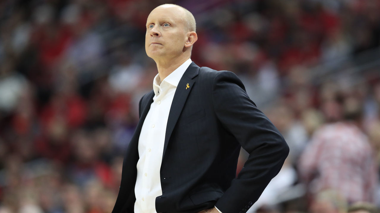 LOUISVILLE, KENTUCKY - JANUARY 25: Chris Mack the head coach of the Louisville Cardinals watches the action against the Clemson Tigers at KFC YUM! Center on January 25, 2020 in Louisville, Kentucky.
