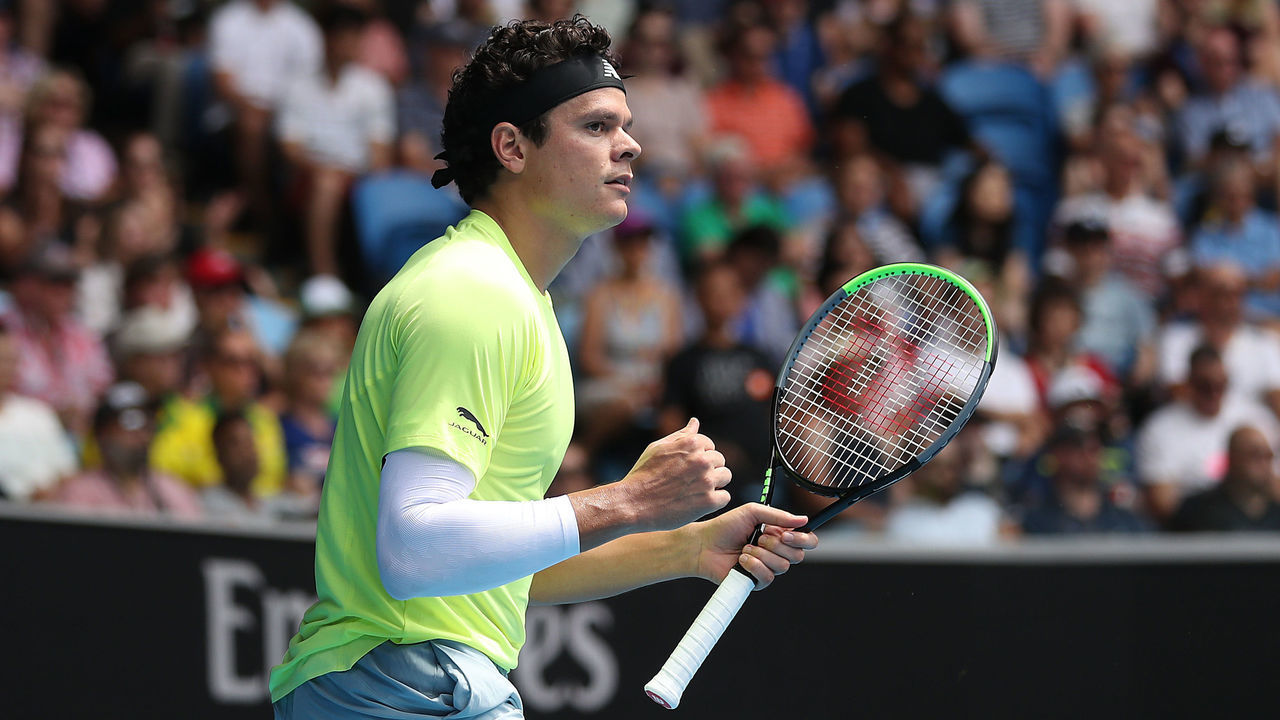 MELBOURNE, AUSTRALIA - JANUARY 26: Milos Raonic of Canada celebrates after winning set point during his Men's Singles fourth round match against Marin Cilic of Croatia on day seven of the 2020 Australian Open at Melbourne Park on January 26, 2020 in Melbourne, Australia.
