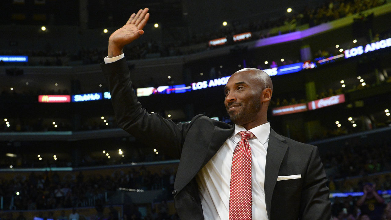 LOS ANGELES, CA - OCTOBER 25: Former Los Angeles Lakers great Kobe Bryant waves to the crord during the first half of the NBA game between the Denver Nuggets and the Los Angeles Lakers on October 25, 2018 at STAPLES Center in Los Angeles, California.