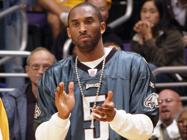 LOS ANGELES - FEBRUARY 3: Kobe Bryant #8 of the Los Angeles Lakers wears quarterback Donovan McNabb's #5 Philadelphia Eagles jersey during the game against the San Antonio Spurs on February 3, 2005 at the Staples Center in Los Angeles, California. The Spurs won 103-91. NOTE TO USER: User expressly acknowledges and agrees that, by downloading and/or using this photograph, User is consenting to the terms and conditions of Getty Images License Agreement. Mandatory Copyright Notice: Copyright 2005 NBAE
