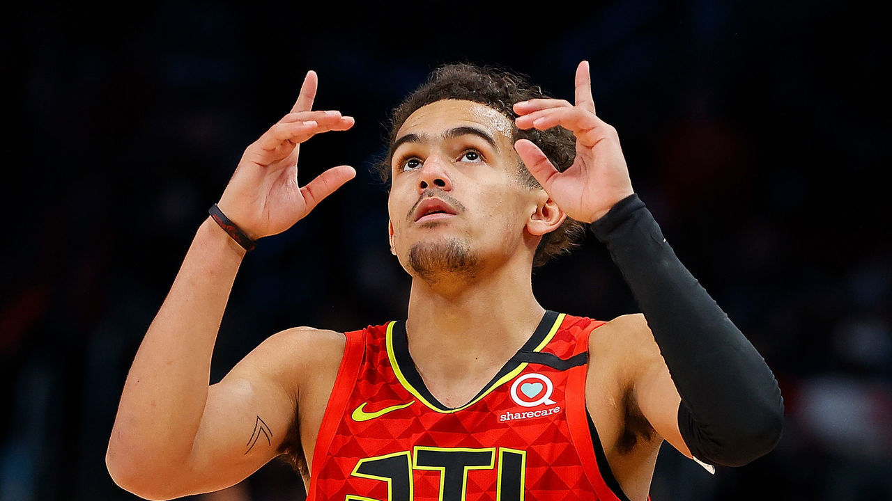 ATLANTA, GEORGIA - JANUARY 26: Trae Young #11 of the Atlanta Hawks reacts after hitting a three-point basket against the Washington Wizards in the second half at State Farm Arena on January 26, 2020 in Atlanta, Georgia. NOTE TO USER: User expressly acknowledges and agrees that, by downloading and/or using this photograph, user is consenting to the terms and conditions of the Getty Images License Agreement.